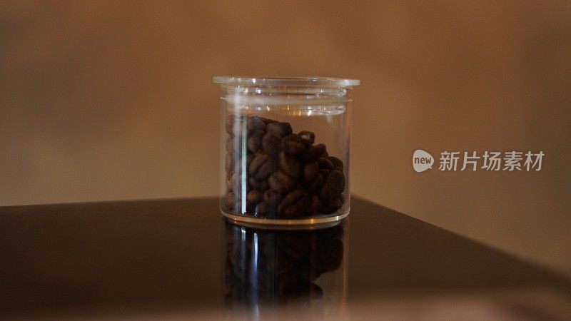 Jars of coffee in a row at the café bar